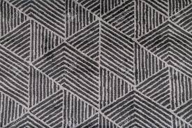 Complementing contemporary or neutral schemes, gifting a sense of space to a room and perfect in a modern family home. Black And Grey Carpet With Hand Made Geometric Pattern Stock Photo Picture And Royalty Free Image Image 104620210