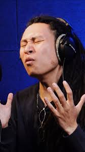 Rising reggae star from China Stinging Ray recording a brand new song