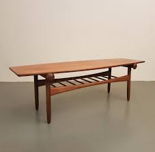 Located in national city, ca. Mid Century Danish Design Teak Reversible Coffee Table 72897