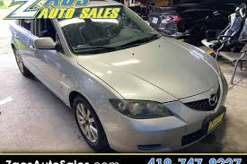 Image result for Sunlight Silver 2007 Mazda3