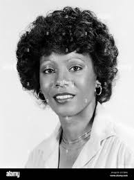 Head shot gold earrings hi-res stock photography and images