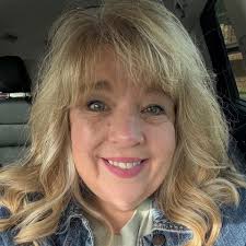 A shooting star is captured above the Lilley Cornett Woods visitor center.  The left side of the image is blurry because the manager's hand was caught  in the long exposure shot. 🌠