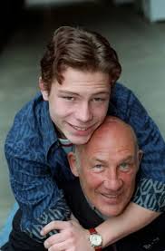 Elliot Moss with Father Stirling