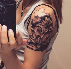 Lotus Flower Shoulder Cap Tattoo The Lotus Is A Great Representation Of Life They Grow From Muddy Water Represe Shoulder Cap Tattoo Tattoos Shoulder Tattoo