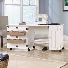 Amazon Com Soft White Sauder Sewing And Craft Table Multiple Finishes Plenty Of Room For Your Equipment And Ac Craft Table Sewing Machine Tables Sewing Table