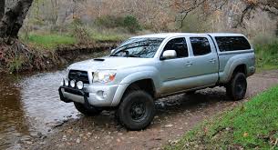 I wanted to make a video about my 2016 toyota tacoma, and how i built a truck bed camper in the back of it. Toyota Truck Caps And Tonneau Covers Snugtop