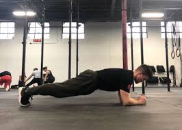 Plank Exercise Guide Bodyweight And Weighted Plank Barbend