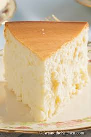 Prepare crumb crust by mixing the graham cracker crumbs, 2 t. Tall And Creamy New York Cheesecake Art And The Kitchen