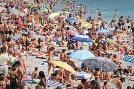 Crowded Beach Uk Holiday Destinations Holiday Destinations British Travel
