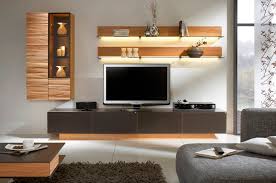 Tv stands also referred to as tv consoles, are furniture items used to hold the television above the floor at a comfortable viewing height for a seated. Living Room Tv Unit Panel Design Novocom Top