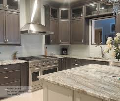 Traditional grey and white kitchen. Gray Cabinets With An Off White Kitchen Island Masterbrand