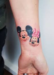 Mickey and minnie are real polite cartoon characters that everyone loves to watch not just in the movies but also in real life, so the ideal fan must be the one with some kind of symbol or tattoo sketched on this ear, face, foot, arms or on chest and the couples really love to draw a mickey and minnie matching tattoos, mickey and minnie kissing. 55 Best Small Disney Tattoo Ideas Minnie Tattoo Mickey Tattoo Disney Tattoos Small
