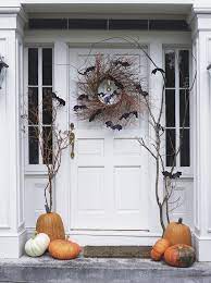 10 Genius Ways To Deck Out Your Porch For Halloween Diy Halloween Wreath Halloween Door Decorations Spooky Halloween Decorations
