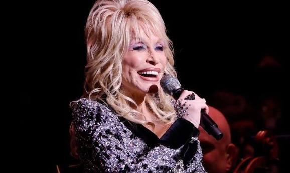 I AIN'T GOT TIME TO GET OLD!" Dolly Parton will turn 80 in January, but she  isn't worried about aging because she feels like she is "just getting  started" and has other