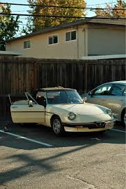 Image result for Beige 1985 Alfa-Romeo