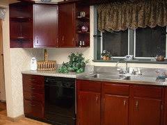 Our kitchen and bathroom wooden cabinets are over 30 years old. Restaining Cabinets Darker Without Stripping