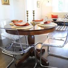 A Vintage Rustic Round Table Plus Clear Acrylic Chairs For A Cozy And Eye Catchy Breakfast Zon Antique Dining Tables Acrylic Dining Chairs Eclectic Dining Room