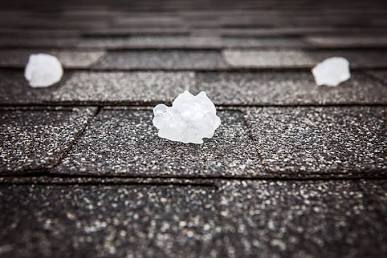 Impact-resistant shingles engineered to survive large hail drops., AI generated