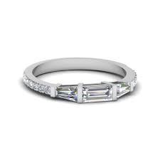 While matching wedding bands is a symbol of you and your new spouse becoming one unit, not matching your bands lets you express your individuality and avoid one of you feeling pressured to choose a band he or she traditionally, the term anniversary band refers to a band with diamonds. Baguette And Round Diamond Thin Wedding Women Band In 18k White Gold Fascinating Diamonds