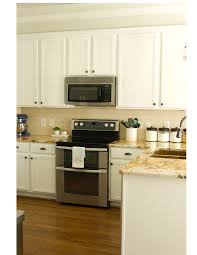 how i painted our kitchen cabinets
