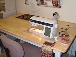 The sewing machine table to the left is an almost size table was a standard height. Drop In Sewing Machine Table Made From A Cheap Dining Room Table Diy Sewing Table Sewing Room Design Quilt Sewing Room