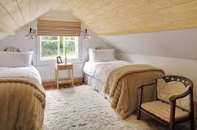 The chandelier is also a nice touch, giving warmth to the entire space. Read This Before You Finish Your Attic This Old House Attic Remodel Attic Bedroom Designs Attic Renovation