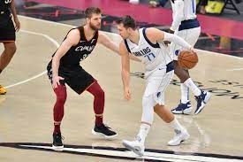 Cleveland cavaliers forward cedi osman (16) attempts a layup as dallas. Sbm3ppguuqvesm