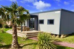 Epingle Par Yelloh Village Les Iles Sur Www Camping Les Iles Com Camping Normandie Bassin Exterieur Plage Du Debarquement