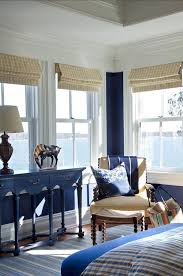 Coastal Living Room Navy Blue White Tan Custom Roman Shades Rugs And Coastal Accents Desi Coastal Bedrooms Coastal Bedroom Decorating Coastal Living Room