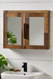 The two mirrors on the front doors appear as one larger mirror for a design that integrates easily into any bath or powder room. Buy Bronx Mirrored Wall Cabinet From The Next Uk Online Shop