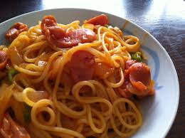Spaghetti napolitan (スパゲッティナポリタン) is a japanese spaghetti dish made with cured meat, green peppers, and ketchup. Naporitan Wikipedia