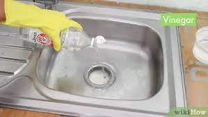 The pitch may be 1/2 inch from the side wall, to the center drain. 3 Ways To Unclog A Kitchen Sink Wikihow