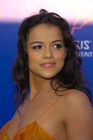 Michelle Rodríguez as Luz/Shé in stills taken from Machete (2010).