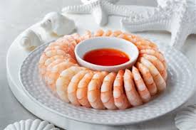 Arrange cold shrimp on a platter and serve with chilled sauce. Shrimp Cocktail Platter 40pcs