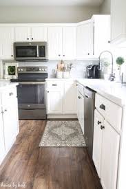 Pair grey kitchen cabinets with wood worktops. Lisa Glosniak Lglosniak Profile Pinterest