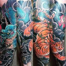 One is descending tiger tattoo style and other is ascending tiger tattoo. 40 Tiger Dragon Tattoo Designs For Men Manly Ink Ideas