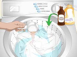 Use downy fabric conditioner to protect against stretching, fading and fuzz. 4 Ways To Restore Faded Clothes Wikihow