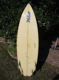 vintage 1980s era McCoy quad-fin surfboard 5-8 colorful