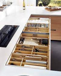 If you keep your dishes in a deep kitchen drawer, insert a dish drawer peg organizer! 15 Kitchen Drawer Organizers For A Clean And Clutter Free Decor