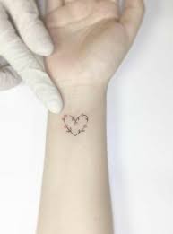 Heart tattoos are just amazing and carries rich symbolism of love and life alongside an array of meanings. 42 Micro Tattoo Heart Flowers Popular Tattoo Concept