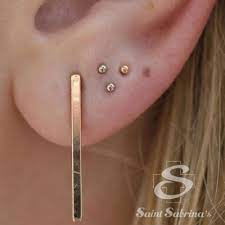 A While Back Courtney Did Three Earlobe Piercings On One Of Our Clients We Really Like How Unique Unique Ear Piercings Three Ear Piercings Earlobe Piercings