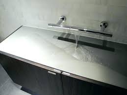 bathroom sink made from a flat boulder