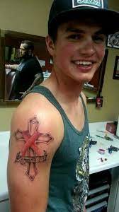 705 likes · 12 talking about this. Men S Cross And Pink Ribbon Tattoo Romans 8 13 Pink Ribbon Tattoos Cancer Survivor Tattoo Cancer Ribbon Tattoos
