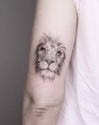 A simple lion tattoo is both powerful and consistent in terms of the silhouette and meaning. Latest Lion Tattoo Designs For Boys Girls Trending 2018 Lion Head Tattoos Lion Tattoo Lion Tattoo Design