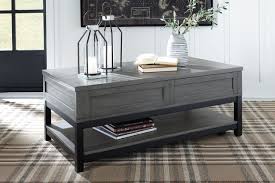 Also, this coffee table with storage is finished on all sides for versatile. Caitbrook Gray Black Rect Lift Top Cocktail Table On Sale At American Furniture Of Slidell Serving Slidell La