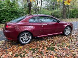 Image result for New Rosso Alfa 2010 Alfa-Romeo