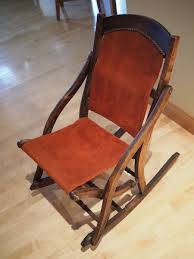 Sticker of road runner on the back. Folding Rocking Chair Later 1800 S Collectors Weekly