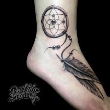 A dreamcatcher tattoo design, like the one in the photo, will make you stand out with your unique dream catcher tattoo. 50 Gorgeous Dreamcatcher Tattoos Done Right Tattooblend