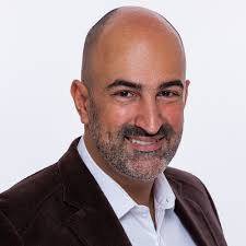 From Outputs to Business Outcomes with OKR: The Elsevier Journey