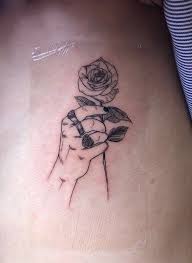 Harry styles has racked up more than 50 tattoos since getting his first ink on his 18th birthday in 2012. This Will Be My First Tattoo Harry Styles Hand Rose Harry Styles Tattoos Harry Tattoos Tattoos